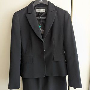 Tahari Two piece skirt suit, size 2 petite.